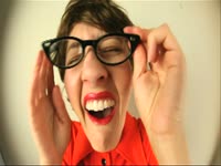 Girl with Glasses Laughs
